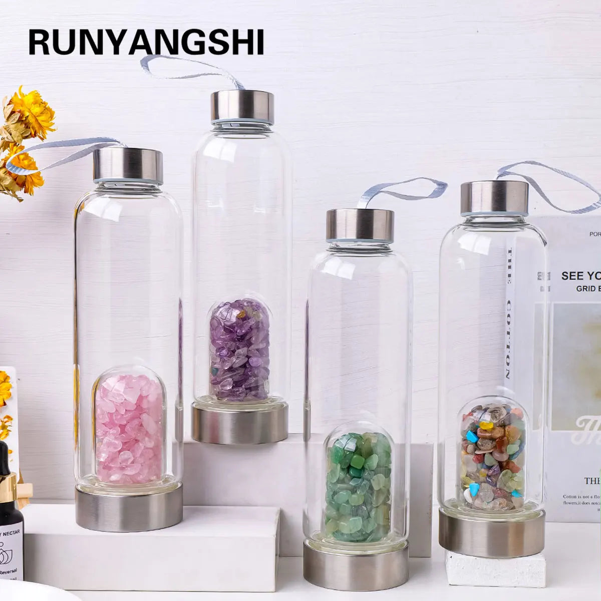 Crystal clear water bottles with magnificent quartz crystals infused